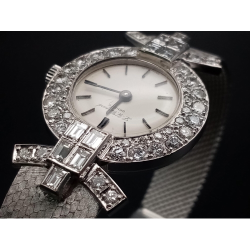 332 - A Chopard 18K White Gold and Diamond Ladies Watch. White gold strap and case - 25mm diameter. Diamon... 