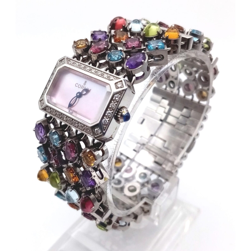 591 - A Corum Gemstone and Diamond Ladies Watch. Multi-gemstone bracelet with diamond bar separators. Case... 