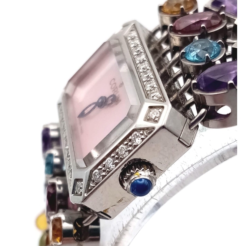 591 - A Corum Gemstone and Diamond Ladies Watch. Multi-gemstone bracelet with diamond bar separators. Case... 