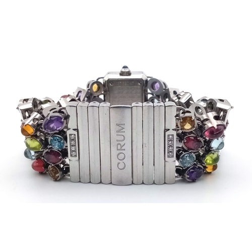 591 - A Corum Gemstone and Diamond Ladies Watch. Multi-gemstone bracelet with diamond bar separators. Case... 