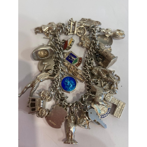 537 - Vintage SILVER CHARM BRACELET , absolutely full of SILVER CHARMS to include Spinning wheel, Castle,I... 