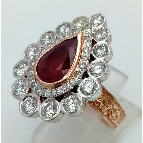 67 - A Gold Plated Silver, Red Stone and Diamond Ring. A central red teardrop stone with two teardrop lay... 
