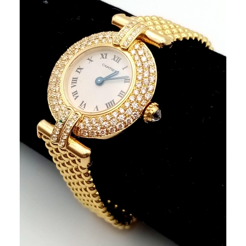 10 - A Cartier 18K Yellow Gold and Diamond Ladies Watch. Gold ball-link bracelet. Gold circular case - 24... 