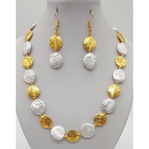 105 - A rarely seen, coin shaped, large natural pearls and 18K yellow gold plated spacer beads in a neckla... 