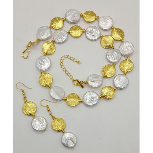 105 - A rarely seen, coin shaped, large natural pearls and 18K yellow gold plated spacer beads in a neckla... 