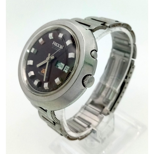 1096 - A Vintage Ricoh 21 Jewel Automatic Gents Watch. Stainless steel strap and case - 41mm. Metallic brow... 