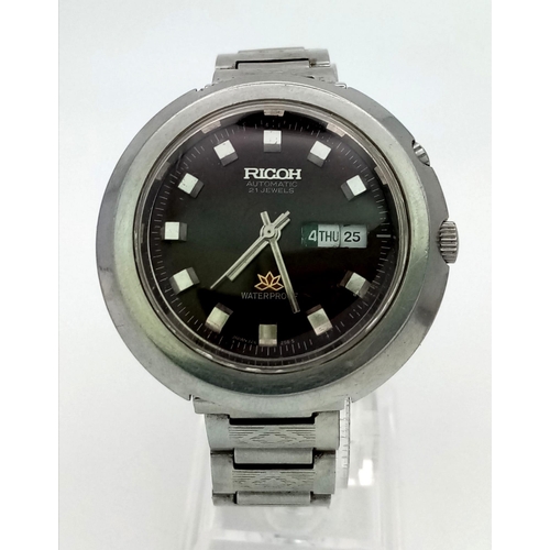 1096 - A Vintage Ricoh 21 Jewel Automatic Gents Watch. Stainless steel strap and case - 41mm. Metallic brow... 