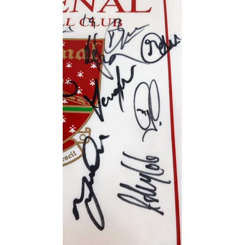 131 - An Arsenal FC 2002 Squad Signed Arsenal Banner. Signatures include: Viera, Henry, Campbell and Bergk... 