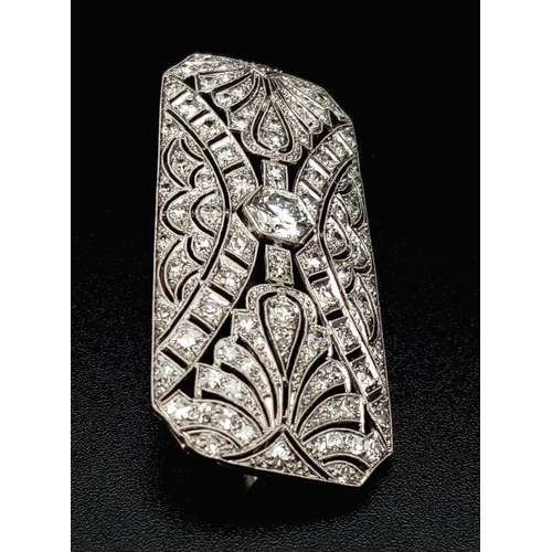 181 - An Art Deco Style Platinum and Diamond Brooch Pin. Geometric pierced decoration. 3ct approx. 5cm wid... 