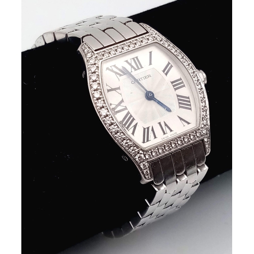 213 - A Cartier 18K Gold and Diamond Tortue Ladies Watch. 18K gold bracelet and case - 25mm. White dial. M... 