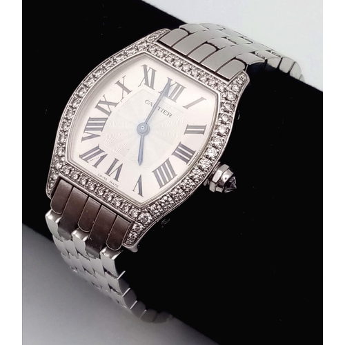 213 - A Cartier 18K Gold and Diamond Tortue Ladies Watch. 18K gold bracelet and case - 25mm. White dial. M... 