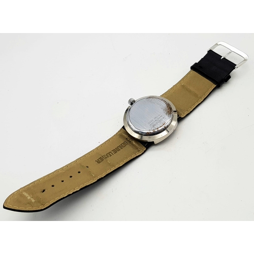 1209 - A Rare Vintage Mentor Jump Watch. Black leather strap. Stainless steel case - 38mm. Mechanical movem... 