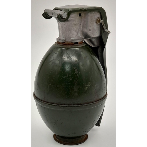 201 - INERT Vietnam War Era US M26 hand grenade. The grenade with a smooth casing and a single rib along t... 