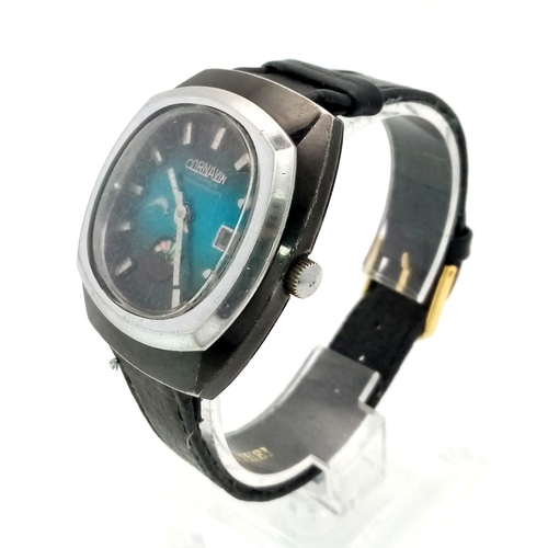 276 - A Rare Cornavin Mystery Watch. Black leather strap. Case - 38mm. Shades of blue dial with date and m... 