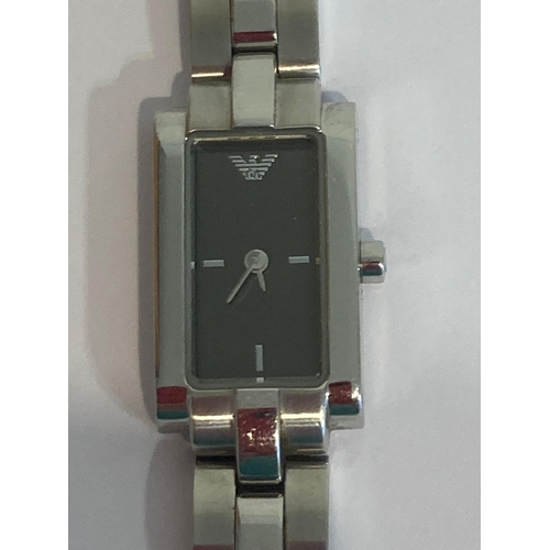 502 - Ladies ARMANI AR5432 Quartz wristwatch. Black face square dial model, Finished in stainless steel si... 