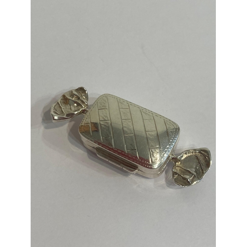 523 - Unusual SILVER PILL BOX in the form of a wrapped toffee. London Silver hallmark . Exceptionally fine... 