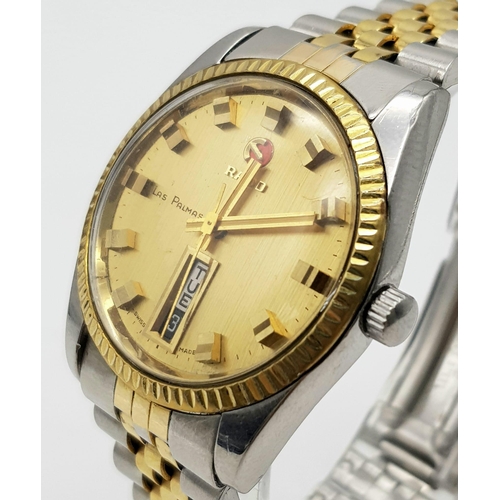 1110 - A Lovely Vintage Rado Las Palmas Automatic Gents watch. Two tone strap and case - 36mm. Gold tone di... 