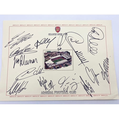 172 - A Signed 2003/4 (invincibles) Arsenal FC A4 Card Flyer. Highbury ground in the centre surrounded by ... 