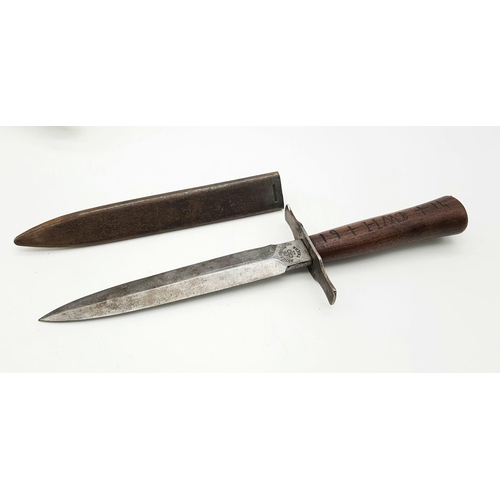 175 - WW2 German Luftwaffe Pilots Boot Knife/Dagger. Wooden grip with tang secured by pins/rivets and a fl... 