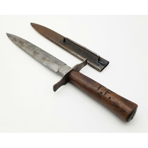 175 - WW2 German Luftwaffe Pilots Boot Knife/Dagger. Wooden grip with tang secured by pins/rivets and a fl... 