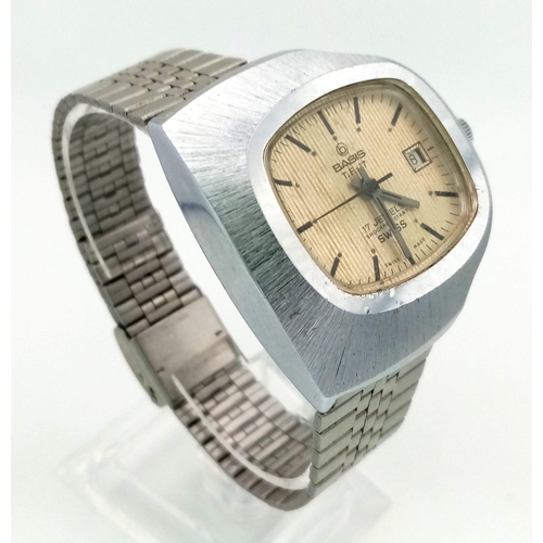 262 - A Rare Vintage Basis T.F. 17 Mechanical Gents Watch. Stainless steel strap and case - 40mm. Gold ton... 