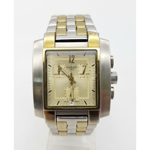 95 - A Tissot 1853 Chronograph Gents Watch. Two-tone strap and case - 35mm. Gold tone dial with three sub... 