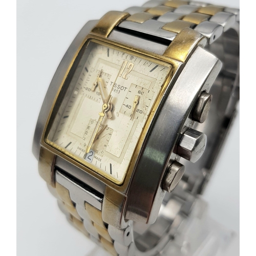 95 - A Tissot 1853 Chronograph Gents Watch. Two-tone strap and case - 35mm. Gold tone dial with three sub... 