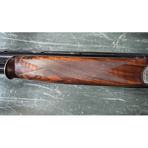 375 - A Beretta 687 EELL 12 Gauge Over/Under Shotgun. 30 inch barrels. Shotgun licence required.