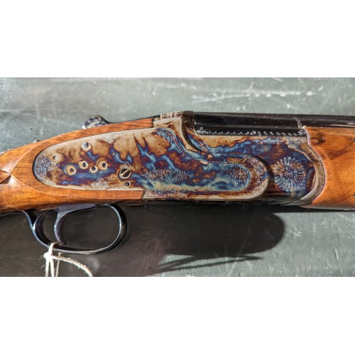 145 - A Jenson 20 Gauge Over/Under Shotgun. Serial Number - 0704. 30 inch barrels. 3 inch chambers. 14.75 ... 