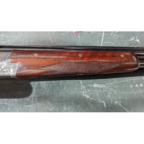 294 - A 12 Gauge Merkel Over/Under Shotgun. Serial number - 59499. 28 inch barrels. 2.75 inch chambers. 14... 