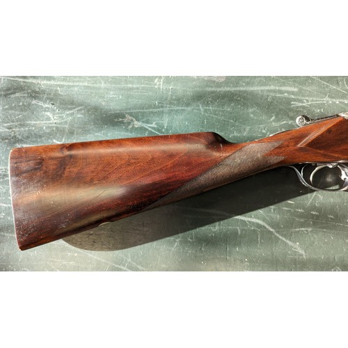 294 - A 12 Gauge Merkel Over/Under Shotgun. Serial number - 59499. 28 inch barrels. 2.75 inch chambers. 14... 