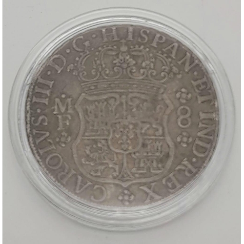 411 - A Silver 1767 Mexican Pillar Dollar Coin with Graffiti. Please see photos for overall conditions.