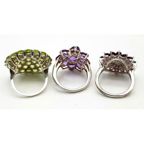 589 - Three 925 Silver Gemstone Rings. Pink topaz, peridot and amethyst floral decorative rings. All size ... 