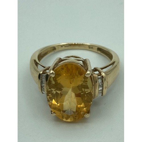 602 - 9 carat GOLD CITRINE AND DIAMOND RING, having large 3 carat cushion cut CITRINE SOLITAIRE set to top... 