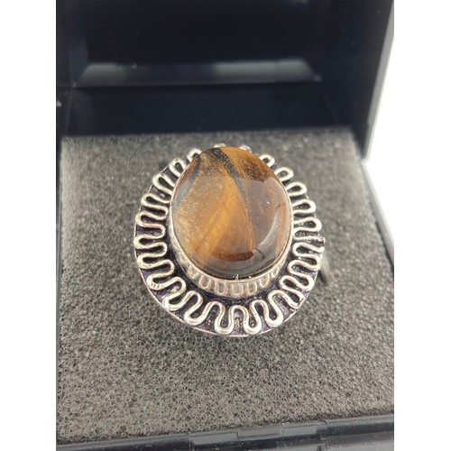 574 - Vintage 1960/70’s  SILVER TIGERS EYE RING having Tigers Eye set to top with large Silver Collar surr... 