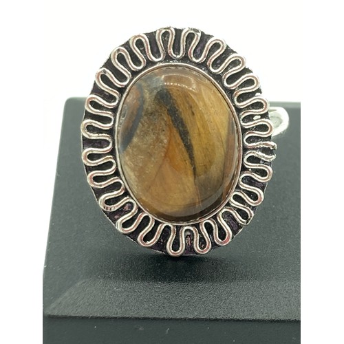 574 - Vintage 1960/70’s  SILVER TIGERS EYE RING having Tigers Eye set to top with large Silver Collar surr... 