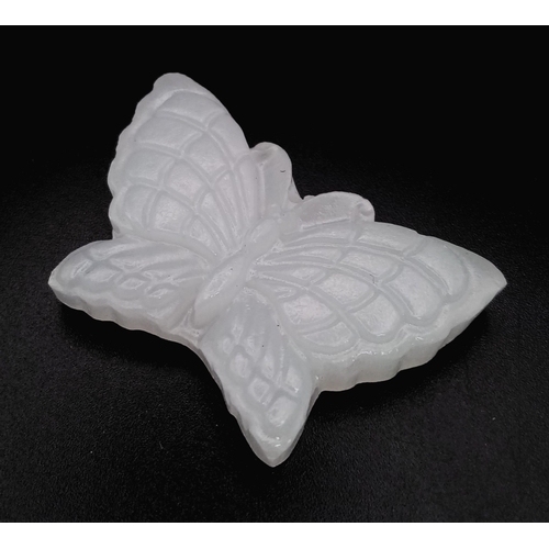 980 - A White Jade Butterfly Pendant. 5cm wingspan.