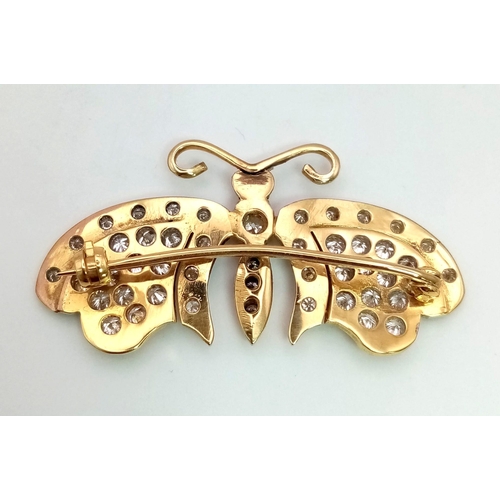 104 - A 9K Yellow Gold Diamond Butterfly Brooch. 1.98ct of round cut diamonds. 4.5cm wingspan. 7.49g total... 