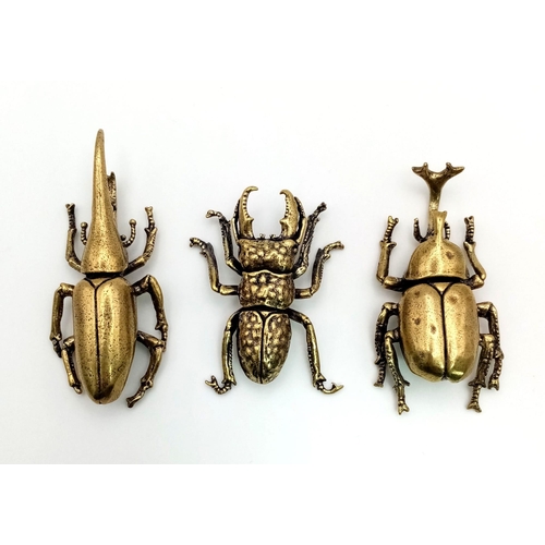 124 - Three Japanese, highly detailed, bronze beetles representing. Virility, Longevity and Rejuvenation. ... 