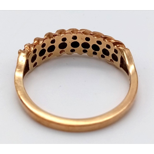 84 - An Antique 9K Yellow Gold Ruby Half-Eternity Ring. Size M. Nine quality round cut rubies. 2.23g tota... 