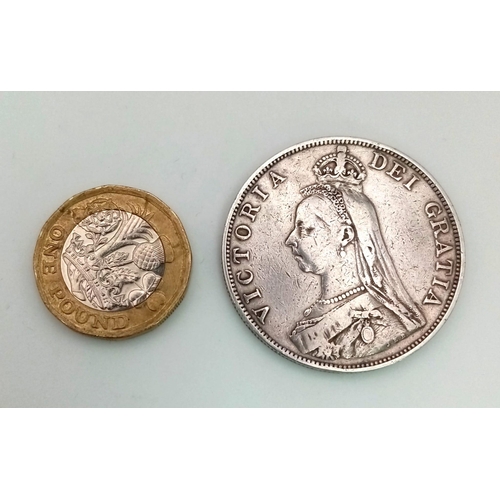 86 - An 1890 Queen Victoria Double Florin Silver Coin. Good definition but please see photos.