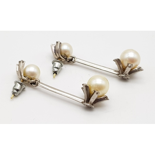 776 - A Pair of Antique 18K White Gold Drop Pearl and Diamond Bar Earrings. 3.5cm drop. 7.62g total weight... 