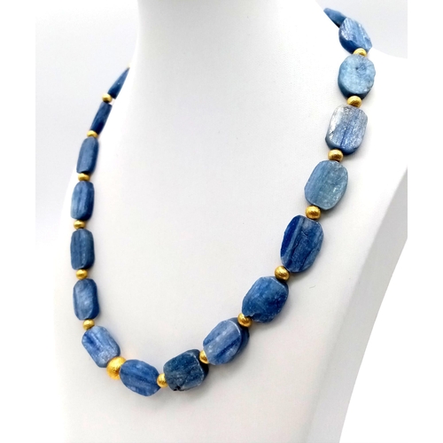 110 - An excellent quality, unusual, large beaded, natural Kyanite necklace and earrings set with gilded a... 