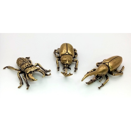 124 - Three Japanese, highly detailed, bronze beetles representing. Virility, Longevity and Rejuvenation. ... 