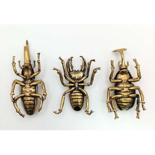 124 - Three Japanese, highly detailed, bronze beetles representing. Virility, Longevity and Rejuvenation. ... 