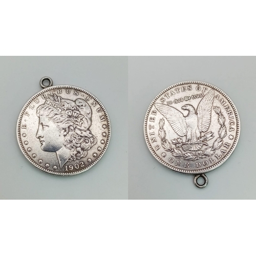 293 - An American silver Dollar pendant, dated 1902 in very good condition. Diameter: 38 mm, weight: 28 g.