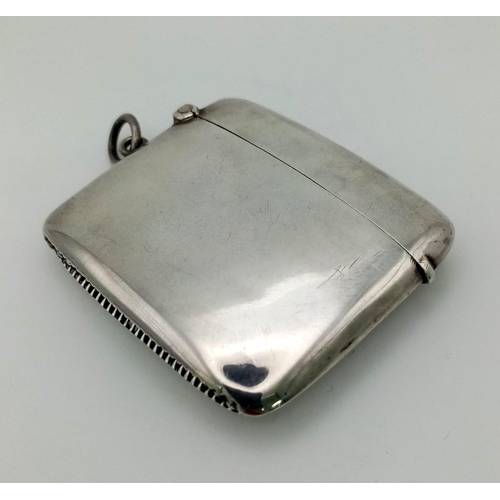 594 - A 1938 Birmingham Hallmarked Sterling Silver Vesta Case - 
5.5 x 4.5cm. 30.5g total weight.