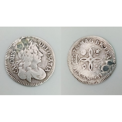 672 - A Charles II 1676 Silver Fourpence Coin. Please see photos for conditions.