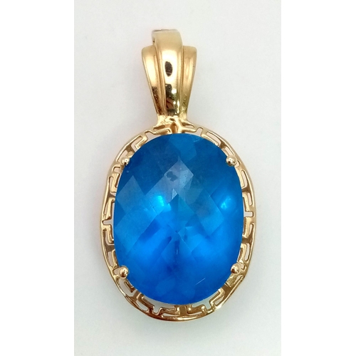 68 - A Beautiful Sky-Blue Faceted Large Topaz Pendant set in 14K Yellow Gold. 20ct topaz. 8.06g total wei... 