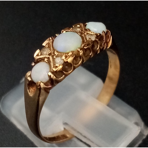 484 - An Edwardian 9K Yellow Gold Three Opal Ring. Size N. 1.89g total weight.